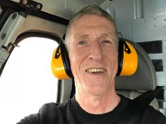 02B Jerome Ryan Ready For Takeoff In The Helicopter In Timika To Fly To Carstensz Pyramid Base Camp